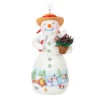 Hallmark Snowtop Lodge Terran S. Gardner Porcelain Ornament 2 Hallmark Snowtop Lodge Terran S. Gardner Porcelain Ornament -Hallmark Store Snowman with Flower Pot Keepsake Ornament 2299QXR8119 01